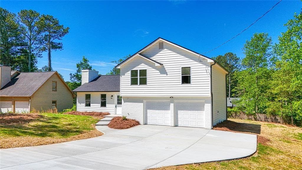 3 bedroom, 2 bathroom, 1,288 sq ft single family residence for sale at 4084 Dollar Circle, Suwanee, GA 30024 — photo 2