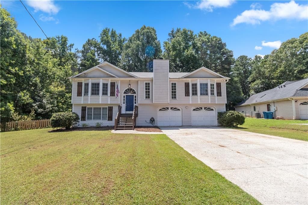 4 bedroom, 3 bathroom, 3,144 sq ft single family residence for sale at 1476 Chateau Circle, Lawrenceville, GA 30043 — photo 1 of 41