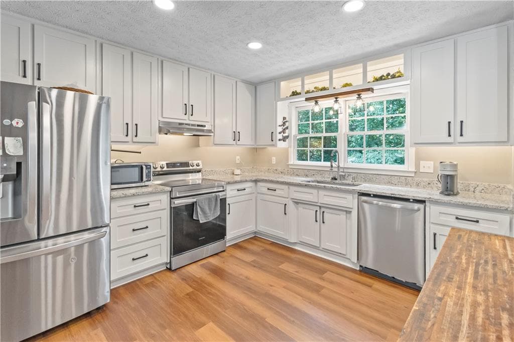 4 bedroom, 3 bathroom, 3,144 sq ft single family residence for sale at 1476 Chateau Circle, Lawrenceville, GA 30043 — photo 8