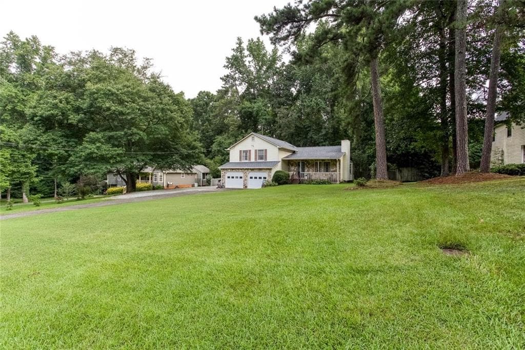 4 bedroom, 2 bathroom, 1,570 sq ft single family residence under contract at 312 Harris Oaks, Dallas, GA 30157 — photo 2