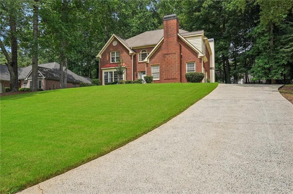 4 bedroom, 3 bathroom, 3,105 sq ft single family residence for sale at 974 Laurel Springs Lane, Marietta, GA 30064 — photo 4