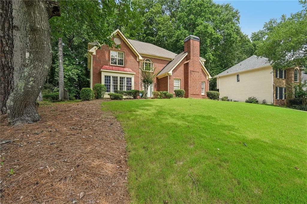 4 bedroom, 3 bathroom, 3,105 sq ft single family residence for sale at 974 Laurel Springs Lane, Marietta, GA 30064 — photo 6