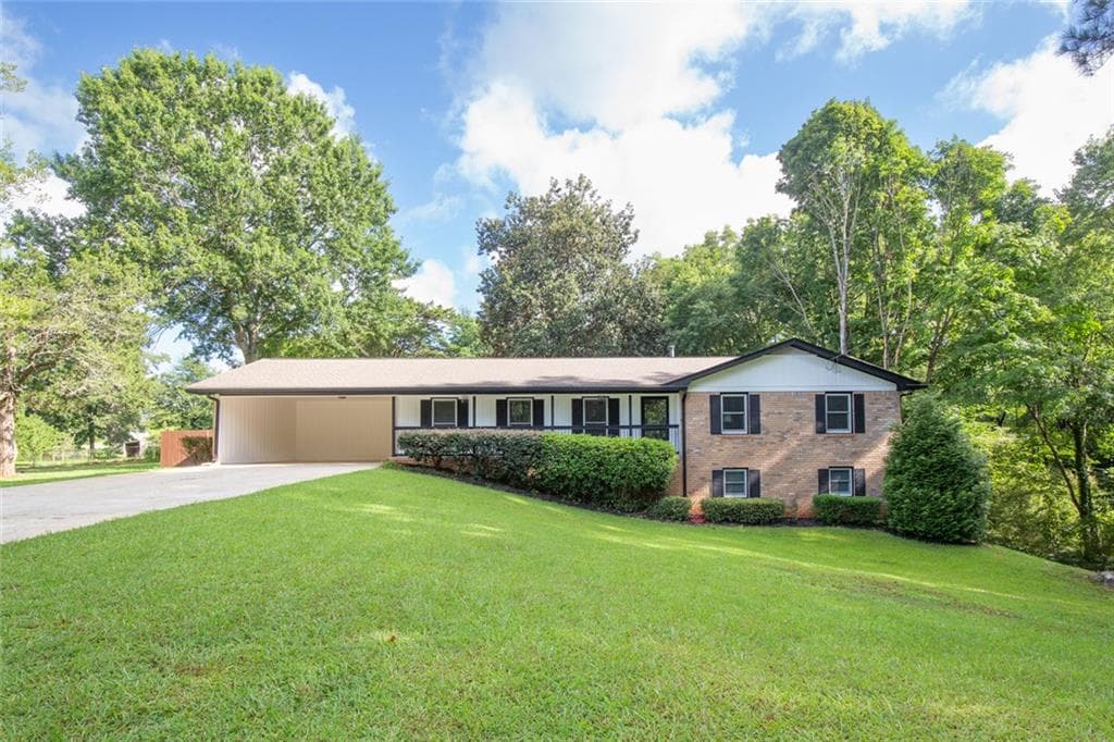 3 bedroom, 2 bathroom, 3,834 sq ft single family residence for sale at 5087 Timber Ridge Court, Stone Mountain, GA 30087 — photo 1 of 43
