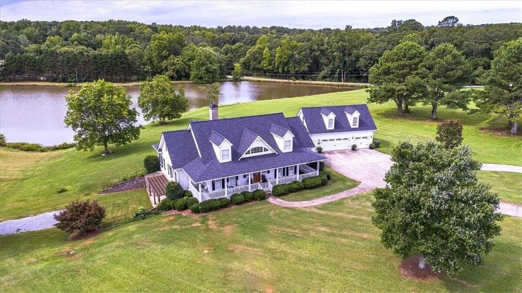 5 bedroom, 4 bathroom, 5,602 sq ft single family residence for sale at 1058 Snip Dillard Road, Monroe, GA 30656 — photo 6