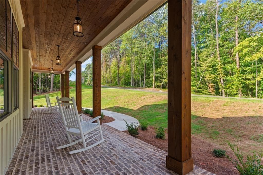 4 bedroom, 4 bathroom, 6,062 sq ft single family residence for sale at 240 Highlands Chase, Ball Ground, GA 30107 — photo 8