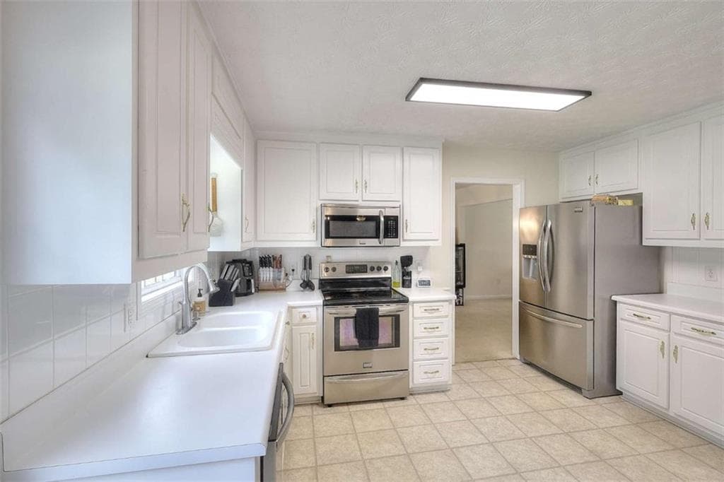 4 bedroom, 3 bathroom, 2,406 sq ft single family residence for sale at 520 Ansley Forest Drive, Monroe, GA 30655 — photo 7