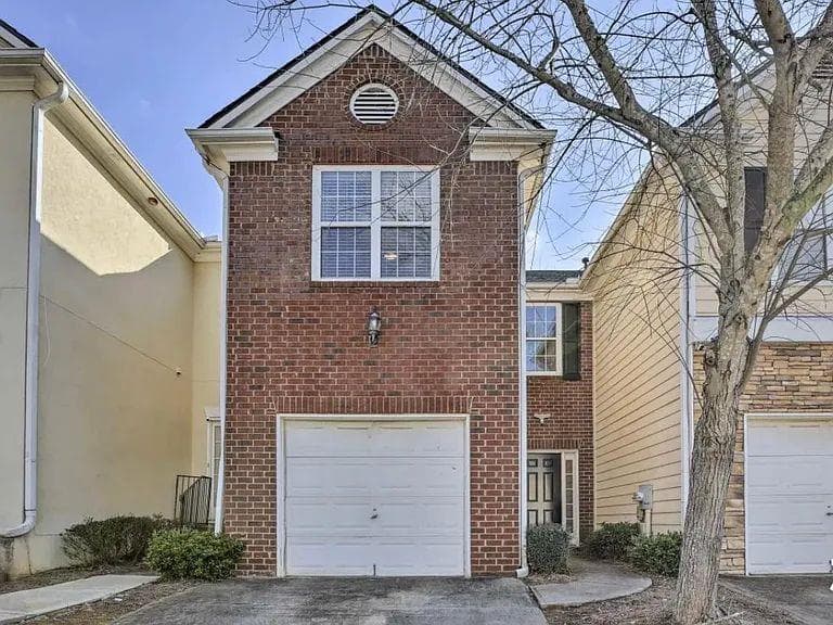 2 bedroom, 3 bathroom, 1,418 sq ft townhouse for sale at 7129 Biltmore Way, Lithonia, GA 30058 — photo 1 of 22