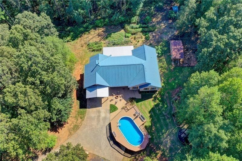 4 bedroom, 4 bathroom, 3,545 sq ft single family residence for sale at 5405 Oak Grove Circle, Cumming, GA 30028
