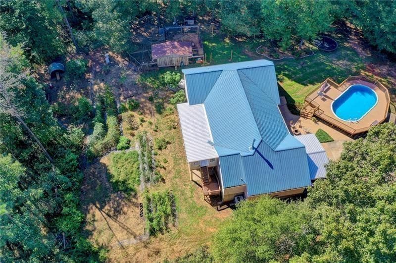 4 bedroom, 4 bathroom, 3,545 sq ft single family residence for sale at 5405 Oak Grove Circle, Cumming, GA 30028 — photo 2