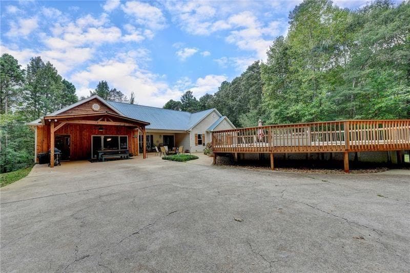 4 bedroom, 4 bathroom, 3,545 sq ft single family residence for sale at 5405 Oak Grove Circle, Cumming, GA 30028 — photo 3