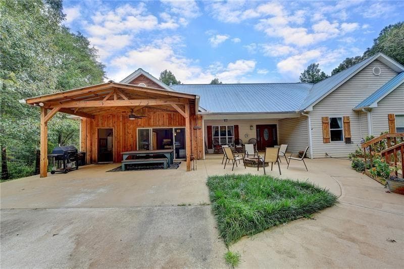 4 bedroom, 4 bathroom, 3,545 sq ft single family residence for sale at 5405 Oak Grove Circle, Cumming, GA 30028 — photo 4