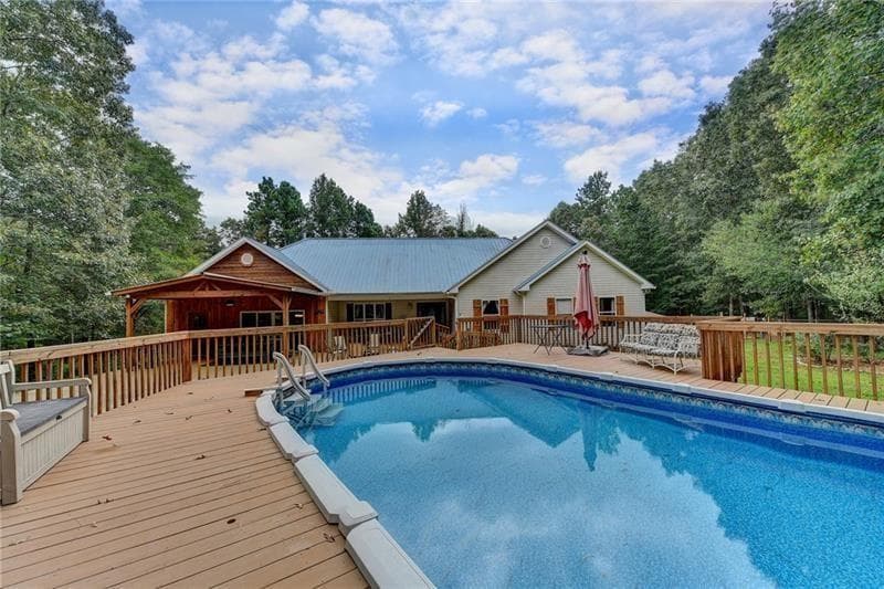 4 bedroom, 4 bathroom, 3,545 sq ft single family residence for sale at 5405 Oak Grove Circle, Cumming, GA 30028 — photo 6