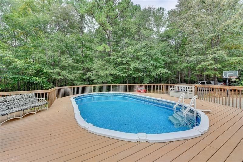 4 bedroom, 4 bathroom, 3,545 sq ft single family residence for sale at 5405 Oak Grove Circle, Cumming, GA 30028 — photo 7