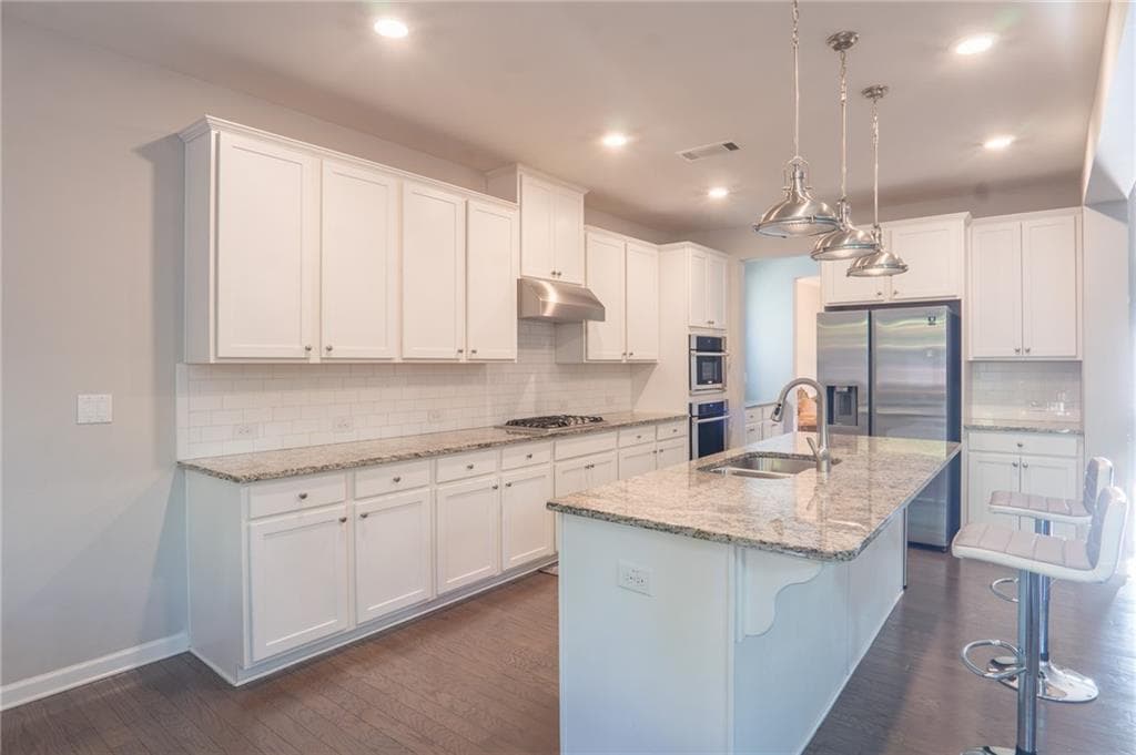 5 bedroom, 3 bathroom, 3,108 sq ft single family residence for sale at 117 Avery Landing Way, Canton, GA 30115 — photo 3