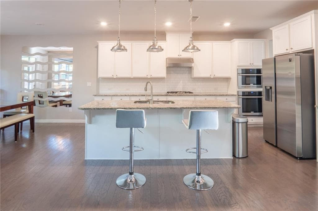 5 bedroom, 3 bathroom, 3,108 sq ft single family residence for sale at 117 Avery Landing Way, Canton, GA 30115 — photo 2