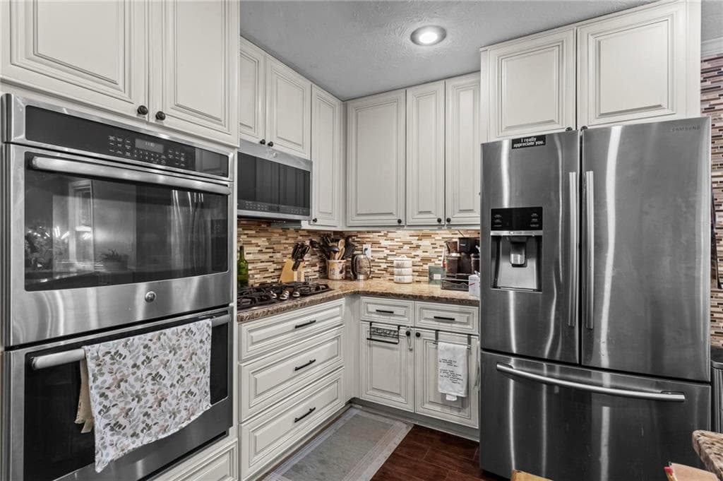 4 bedroom, 4 bathroom, 2,660 sq ft single family residence for sale at 140 Lakeside Drive, Kennesaw, GA 30144 — photo 8