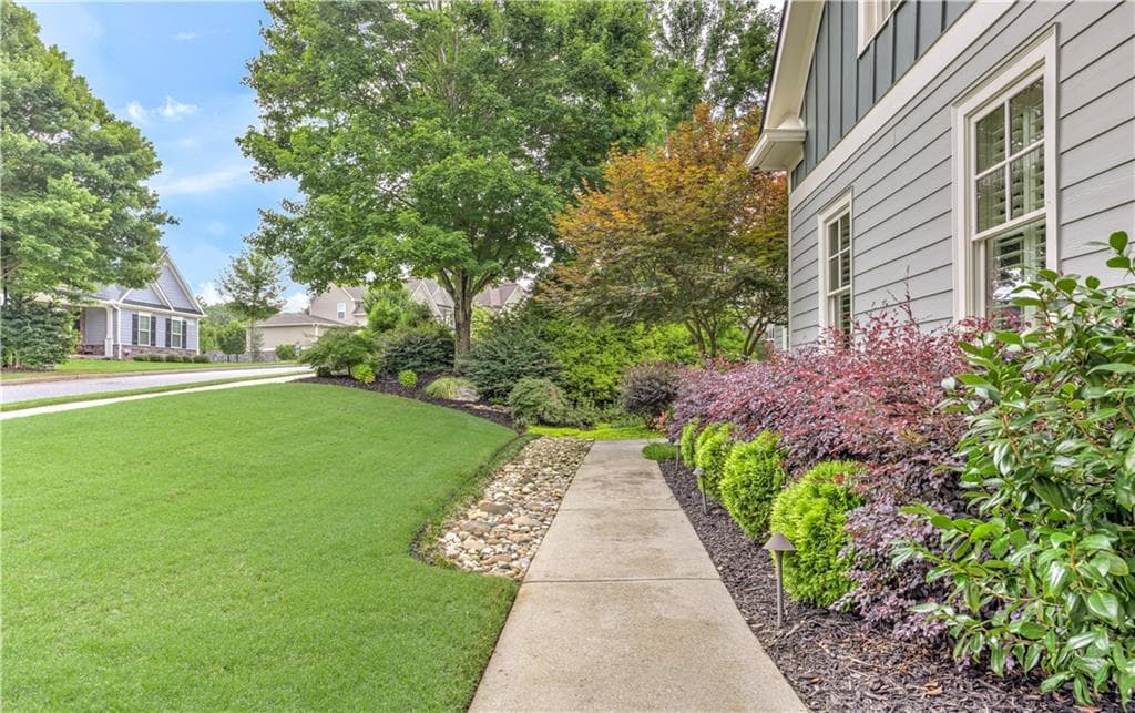 6 bedroom, 5 bathroom, 5,053 sq ft single family residence for sale at 8785 Mica Creek, Ball Ground, GA 30107 — photo 9