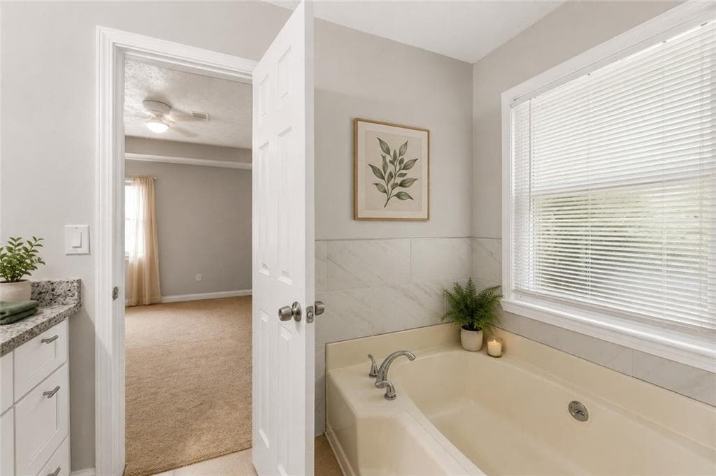 3 bedroom, 2 bathroom, 1,471 sq ft single family residence for sale at 1731 Rose Garden Lane, Loganville, GA 30052 — photo 6