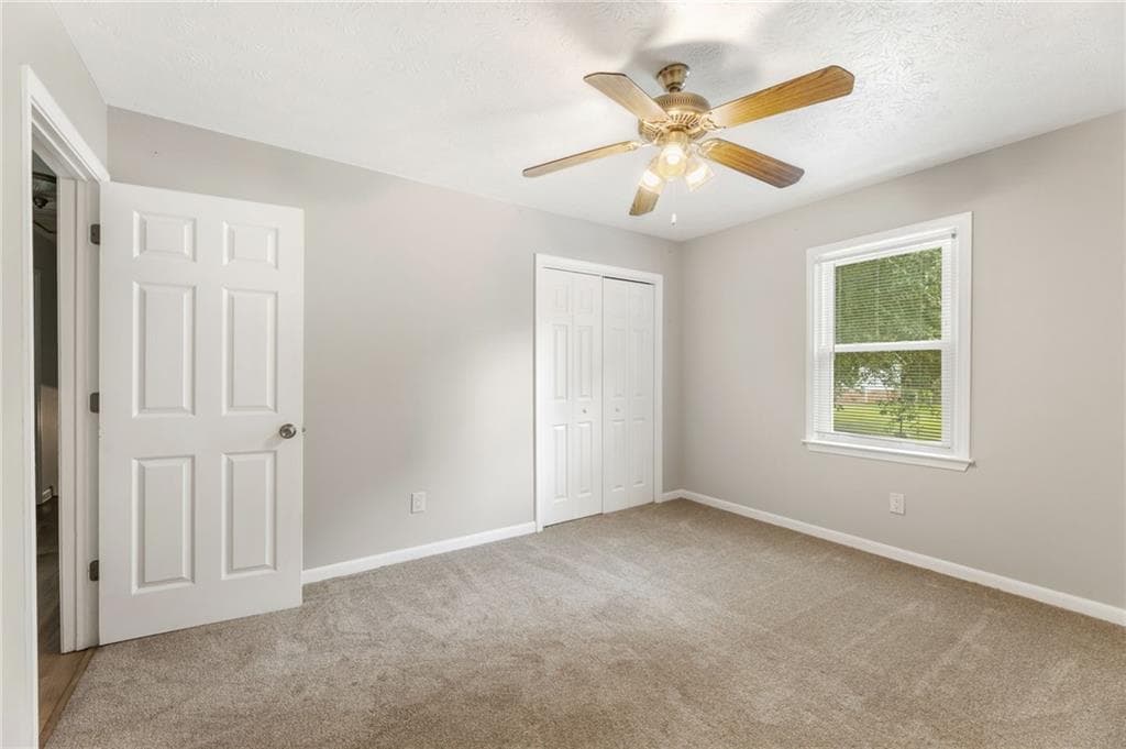 3 bedroom, 2 bathroom, 1,471 sq ft single family residence for sale at 1731 Rose Garden Lane, Loganville, GA 30052 — photo 9