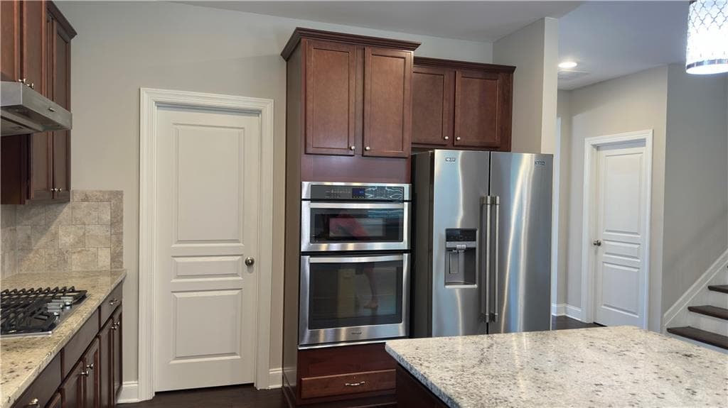 5 bedroom, 4 bathroom, 2,874 sq ft single family residence under contract at 311 Chesterfield Cove, Woodstock, GA 30189 — photo 9
