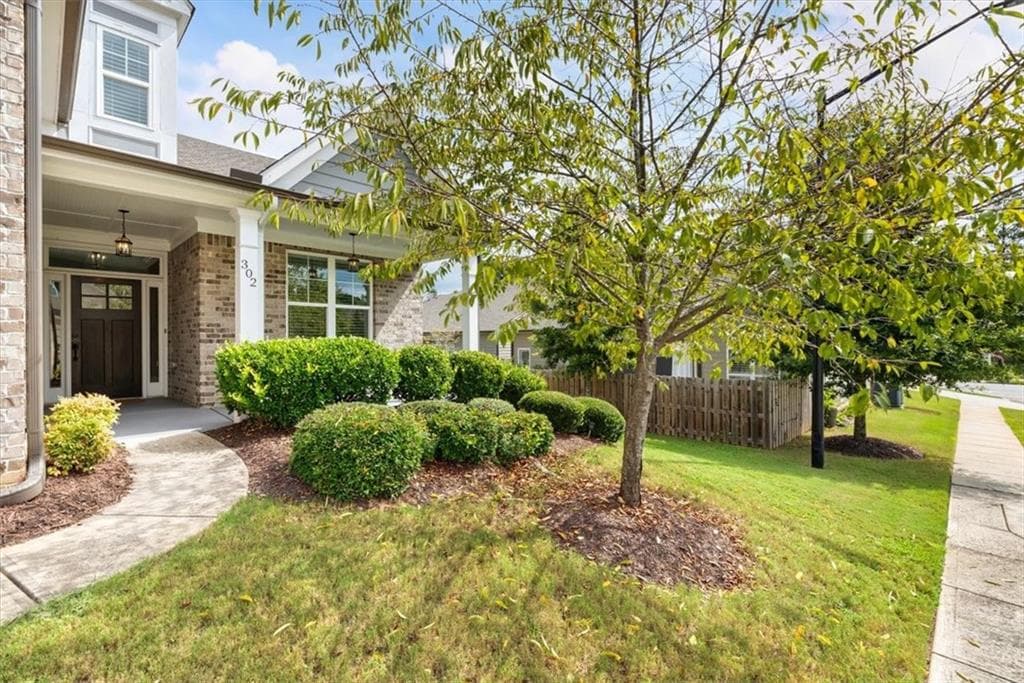 4 bedroom, 3 bathroom, 1,964 sq ft single family residence for sale at 302 Derrymore Drive, Woodstock, GA 30188 — photo 2