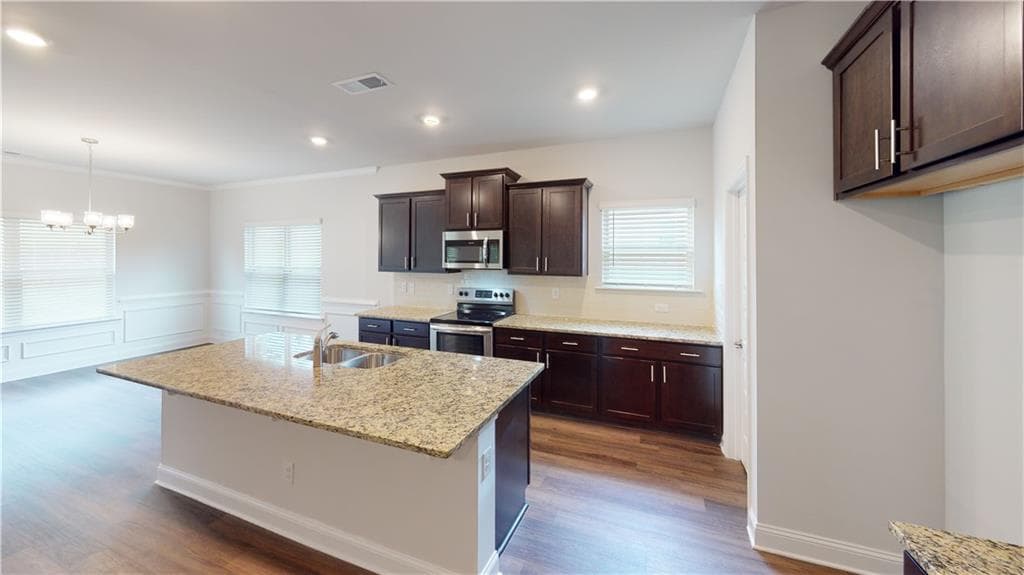4 bedroom, 3 bathroom, 2,421 sq ft single family residence for sale at 1024 Holliday Passs, Griffin, GA 30223 — photo 5