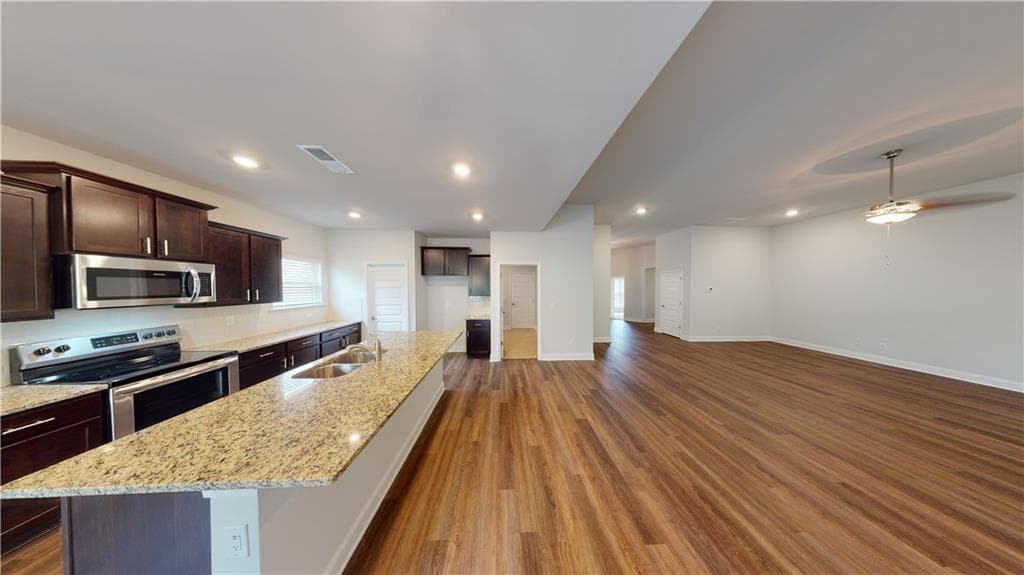 4 bedroom, 3 bathroom, 2,421 sq ft single family residence for sale at 1024 Holliday Passs, Griffin, GA 30223 — photo 6