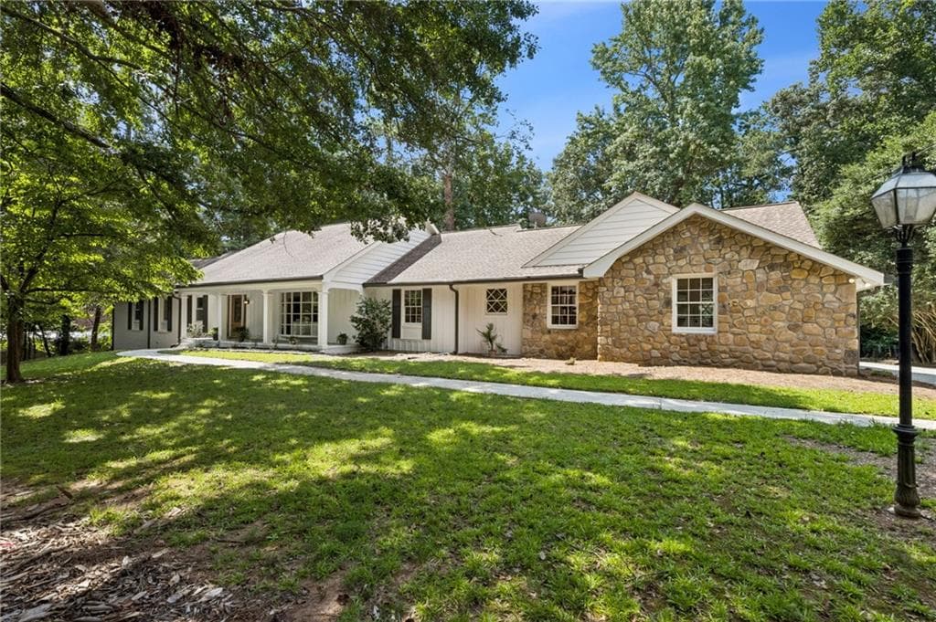4 bedroom, 4 bathroom, 3,177 sq ft single family residence sold at 8115 Winged Foot Drive, Atlanta, GA 30350