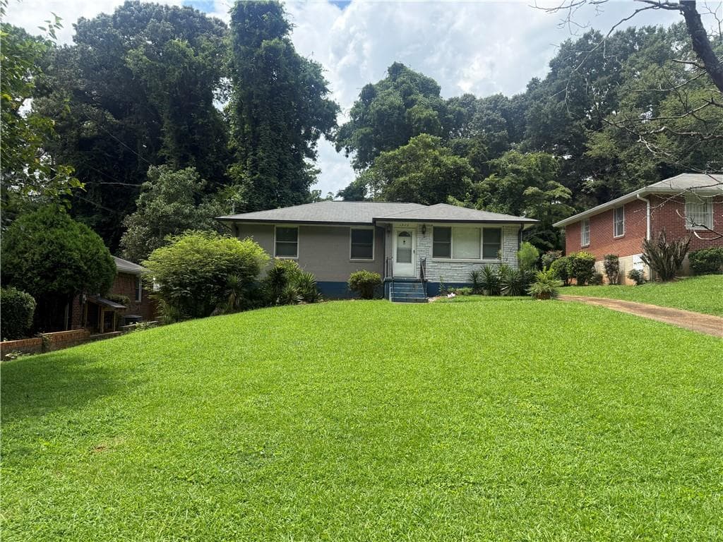 3 bedroom, 1 bathroom, 1,142 sq ft single family residence for sale at 1973 W Lakeside Drive, Decatur, GA 30032