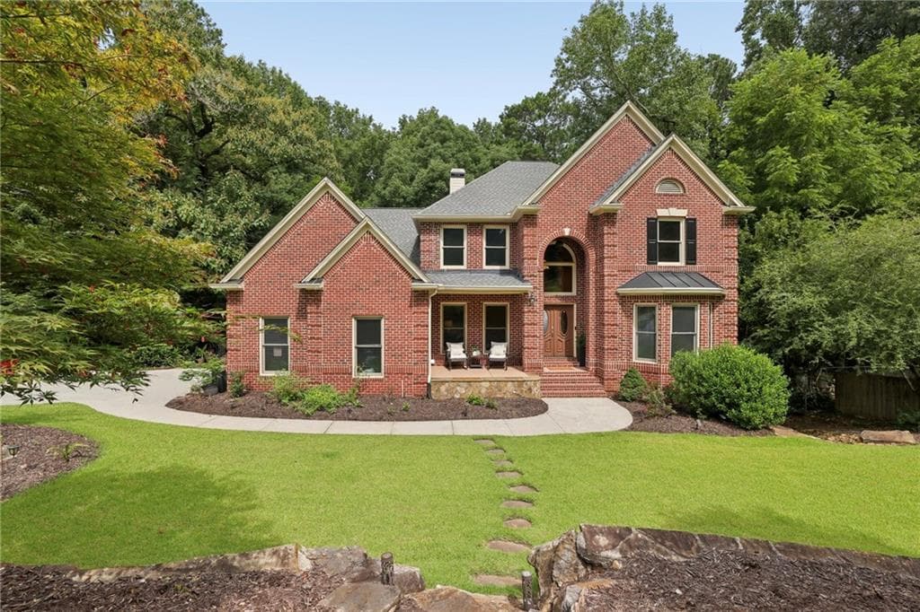 7 bedroom, 6 bathroom, 6,446 sq ft single family residence for sale at 2436 Fontainebleau Drive, Atlanta, GA 30360 — photo 2