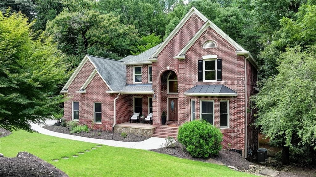 7 bedroom, 6 bathroom, 6,446 sq ft single family residence for sale at 2436 Fontainebleau Drive, Atlanta, GA 30360
