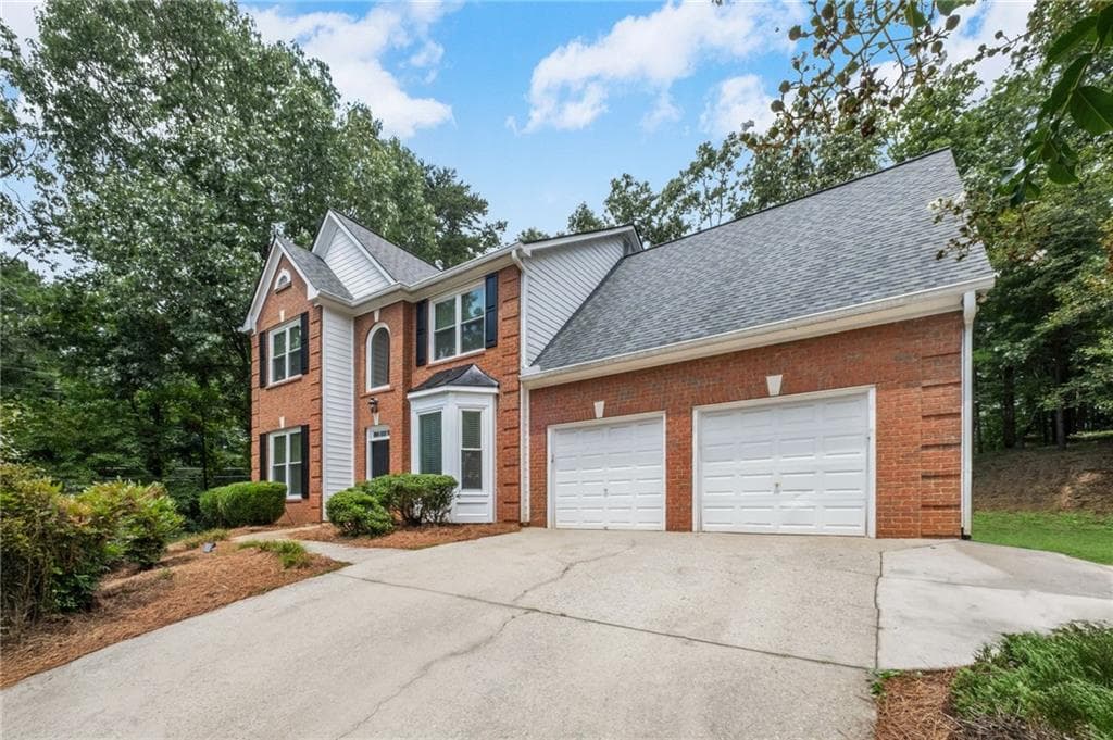 4 bedroom, 3 bathroom, 2,468 sq ft single family residence for sale at 2300 Northwood Drive, Milton, GA 30004 — photo 3