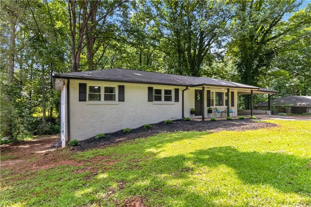 3 bedroom, 3 bathroom, 1,190 sq ft single family residence for sale at 1539 Rockingway Drive, Marietta, GA 30008 — photo 2