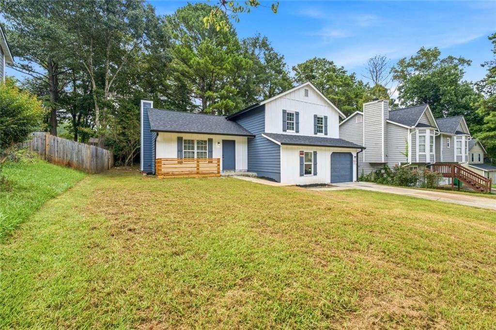 4 bedroom, 3 bathroom, 1,618 sq ft single family residence for sale at 917 Lake Watch Drive, Stone Mountain, GA 30088 — photo 2