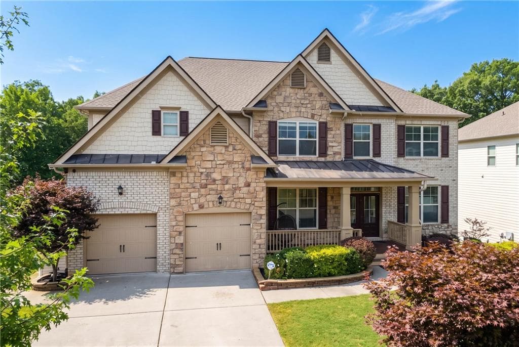 7 bedroom, 5 bathroom, 6,100 sq ft single family residence for sale at 4090 Tobiano Trail, Cumming, GA 30040