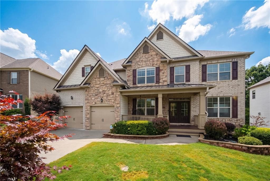 7 bedroom, 5 bathroom, 6,100 sq ft single family residence for sale at 4090 Tobiano Trail, Cumming, GA 30040 — photo 2