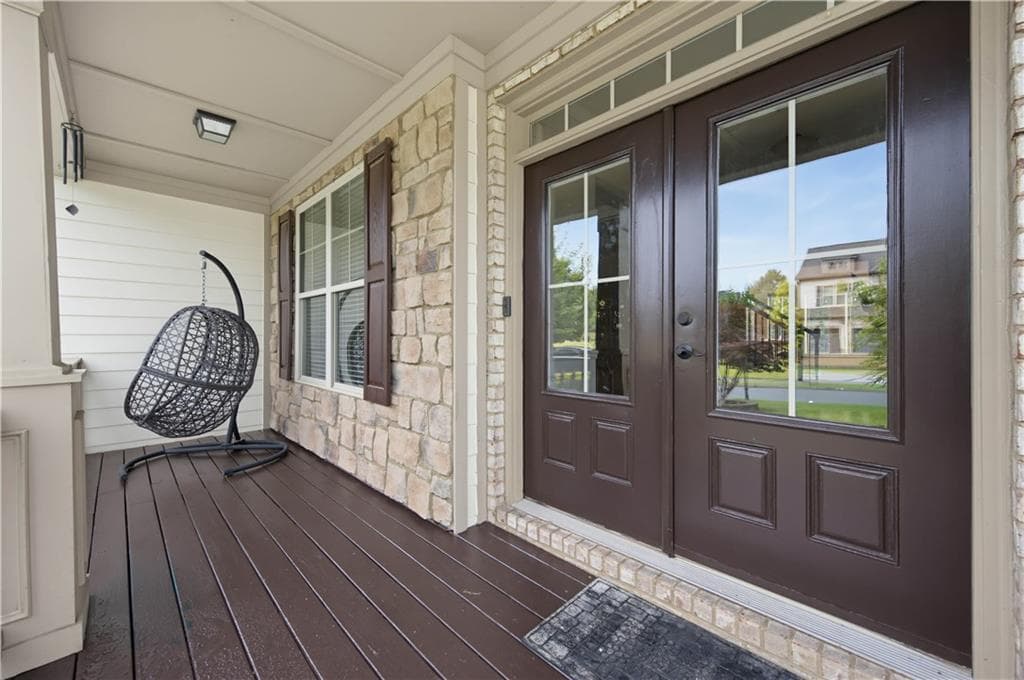 7 bedroom, 5 bathroom, 6,100 sq ft single family residence for sale at 4090 Tobiano Trail, Cumming, GA 30040 — photo 4