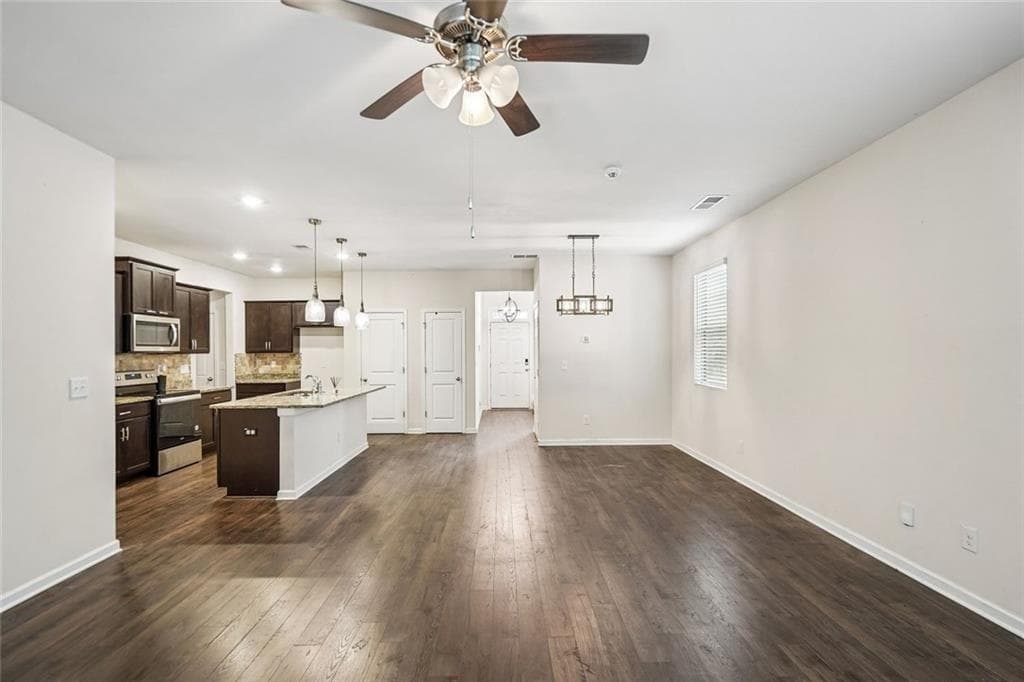 5 bedroom, 4 bathroom, 2,466 sq ft single family residence for sale at 2045 Theberton Trail, Locust Grove, GA 30248 — photo 3