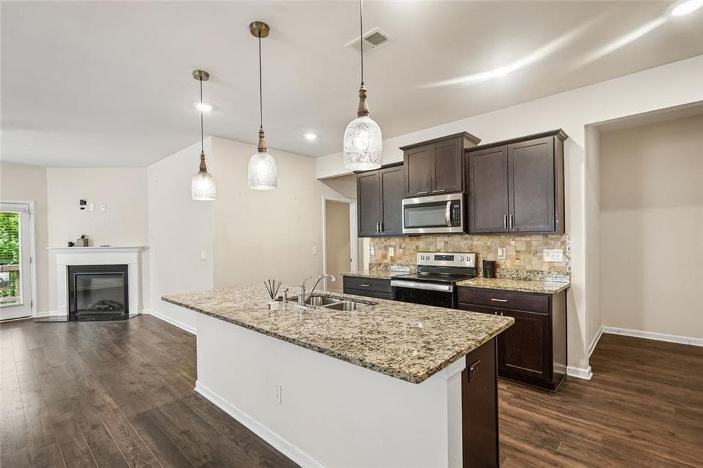 5 bedroom, 4 bathroom, 2,466 sq ft single family residence for sale at 2045 Theberton Trail, Locust Grove, GA 30248 — photo 5