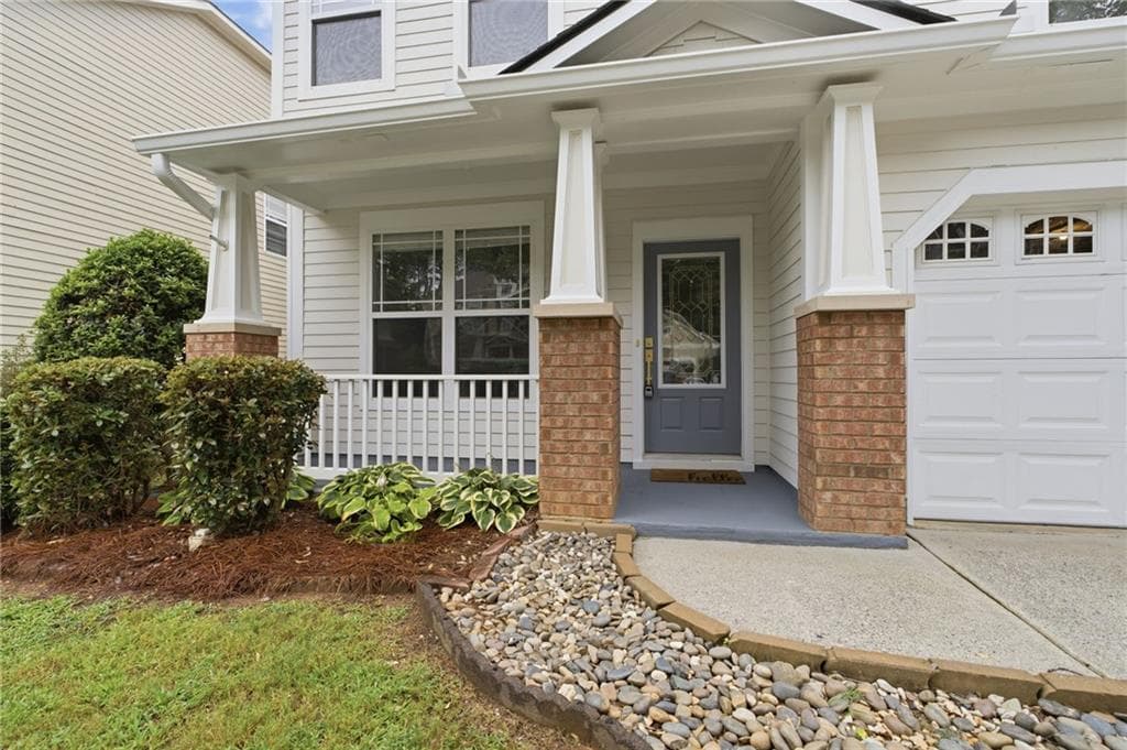 4 bedroom, 3 bathroom, 2,128 sq ft single family residence for sale at 3434 Old Towne Lane, Cumming, GA 30040 — photo 2