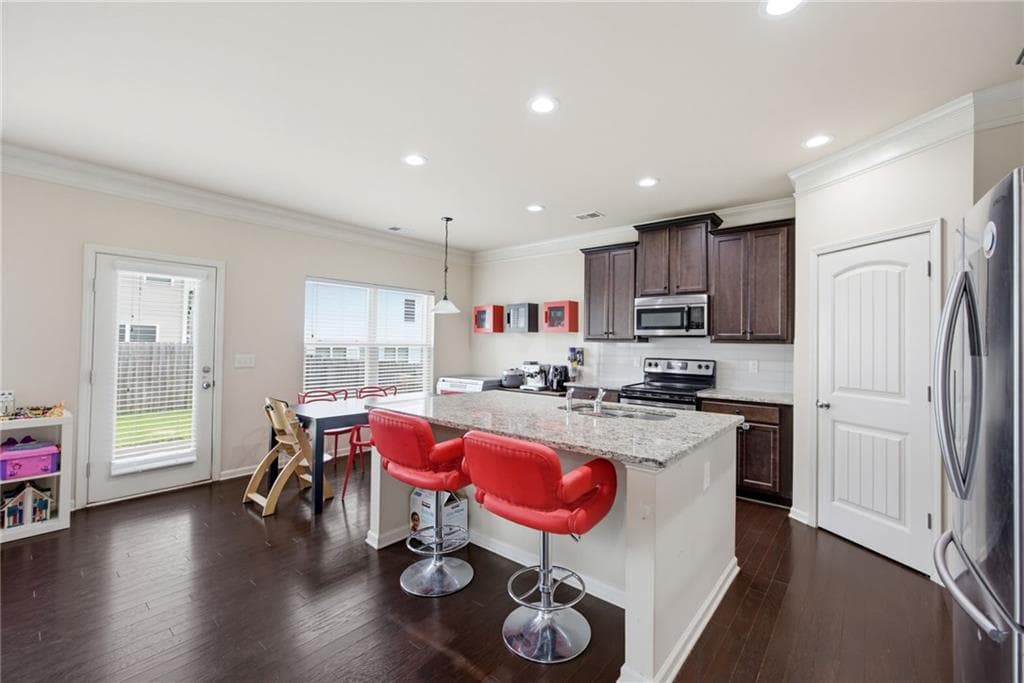 3 bedroom, 3 bathroom, 2,220 sq ft single family residence for sale at 2978 Woodward Down Trail, Buford, GA 30519 — photo 3