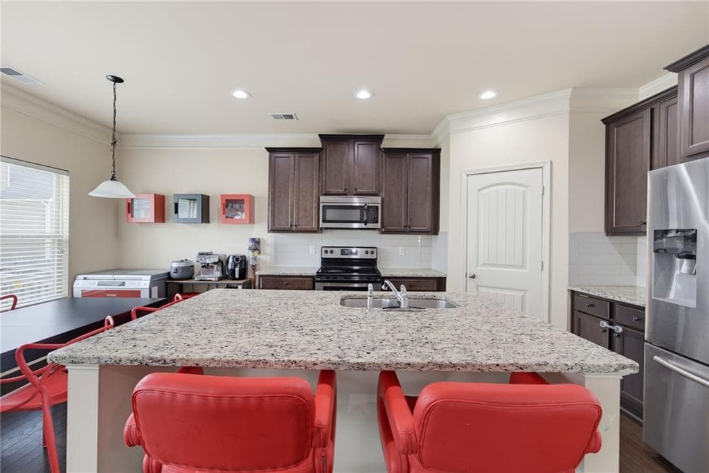 3 bedroom, 3 bathroom, 2,220 sq ft single family residence for sale at 2978 Woodward Down Trail, Buford, GA 30519 — photo 4