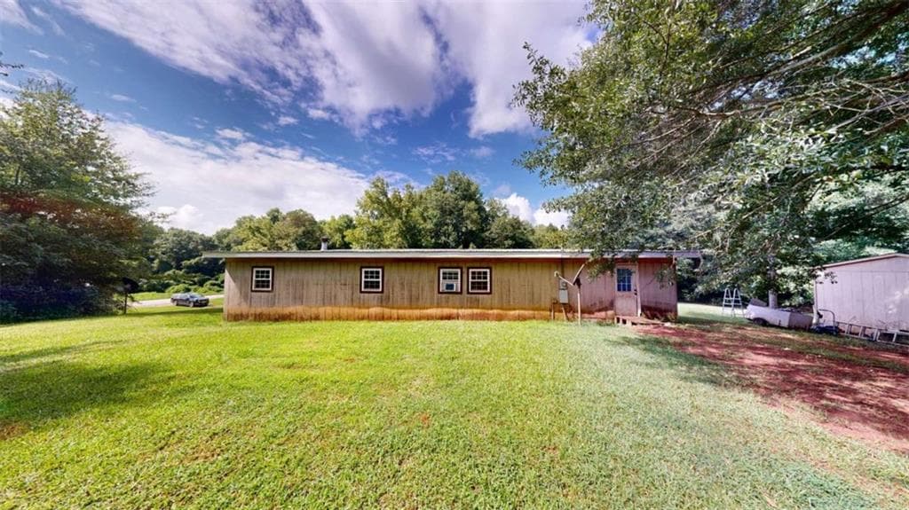 5 bedroom, 2 bathroom, 1,680 sq ft single family residence for sale at 93727 Highway 9, Lineville, AL 36266 — photo 4