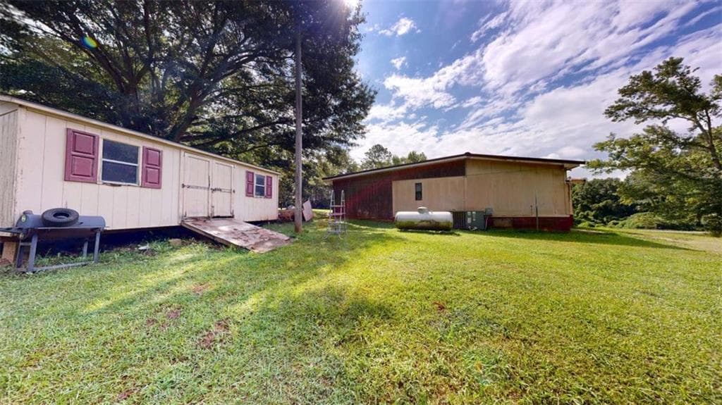 5 bedroom, 2 bathroom, 1,680 sq ft single family residence for sale at 93727 Highway 9, Lineville, AL 36266 — photo 5
