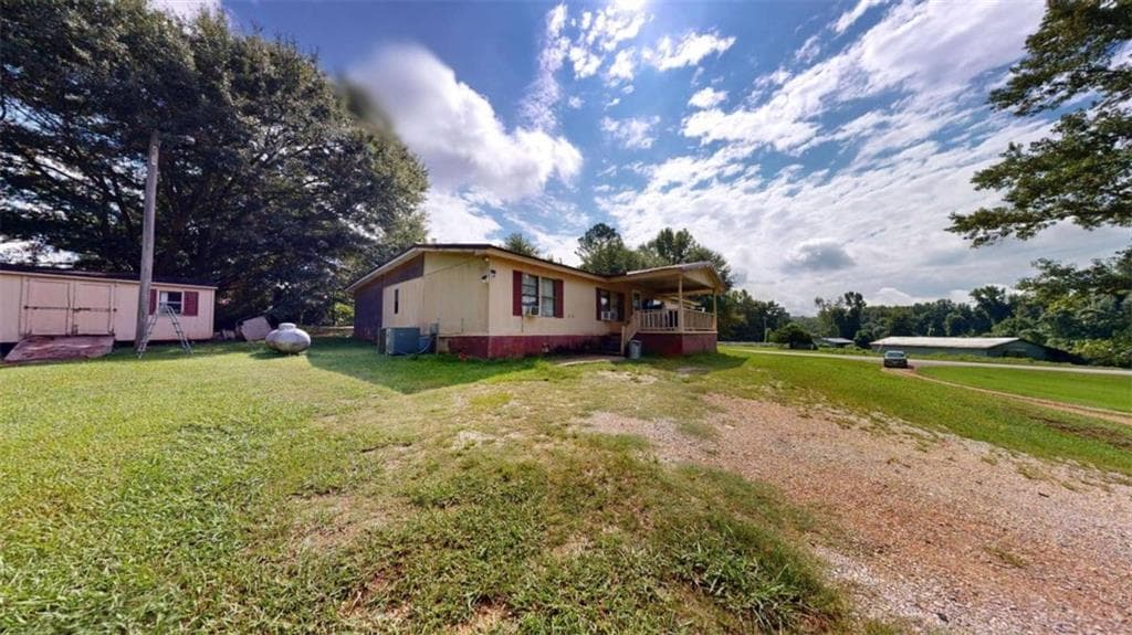 5 bedroom, 2 bathroom, 1,680 sq ft single family residence for sale at 93727 Highway 9, Lineville, AL 36266 — photo 3
