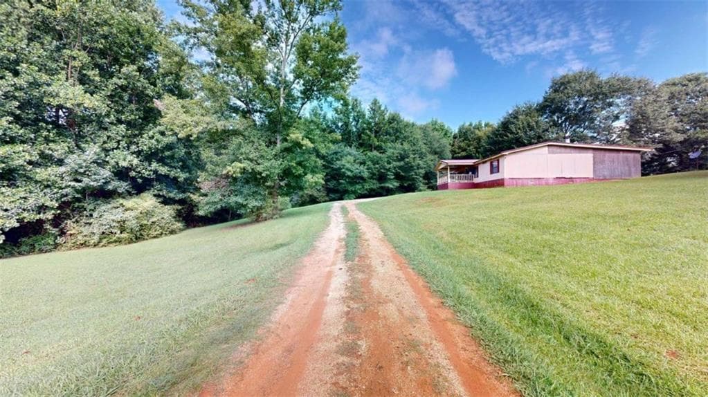 5 bedroom, 2 bathroom, 1,680 sq ft single family residence for sale at 93727 Highway 9, Lineville, AL 36266 — photo 1 of 23