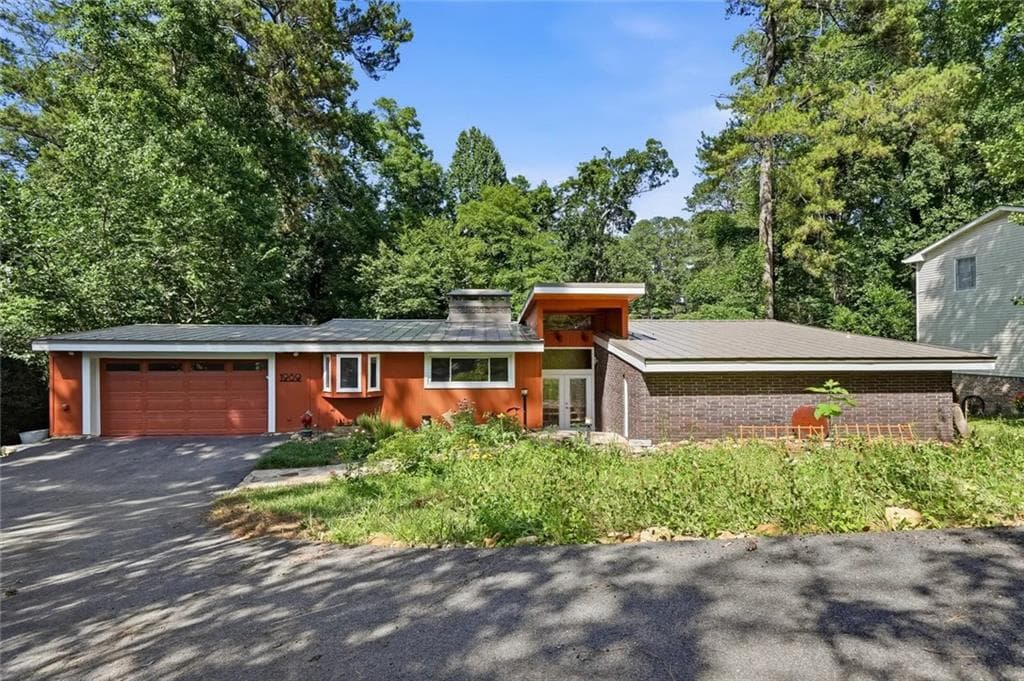 5 bedroom, 3 bathroom, 3,800 sq ft single family residence for sale at 1989 N Ridgeway, Atlanta, GA 30345 — photo 1 of 43