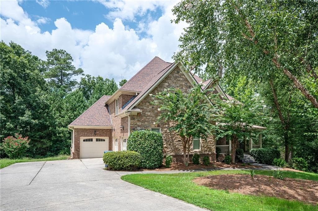6 bedroom, 5 bathroom, 4,900 sq ft single family residence for sale at 1526 Rocky River Drive, Lawrenceville, GA 30045 — photo 2