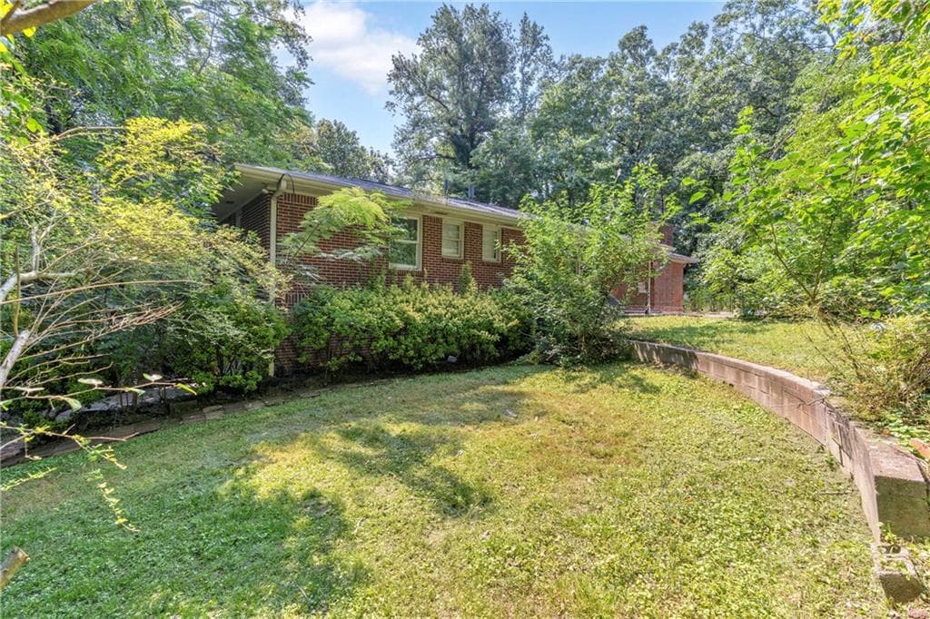 6 bedroom, 2 bathroom, 2,400 sq ft single family residence for sale at 39 Harmony Grove Road, Lilburn, GA 30047 — photo 7