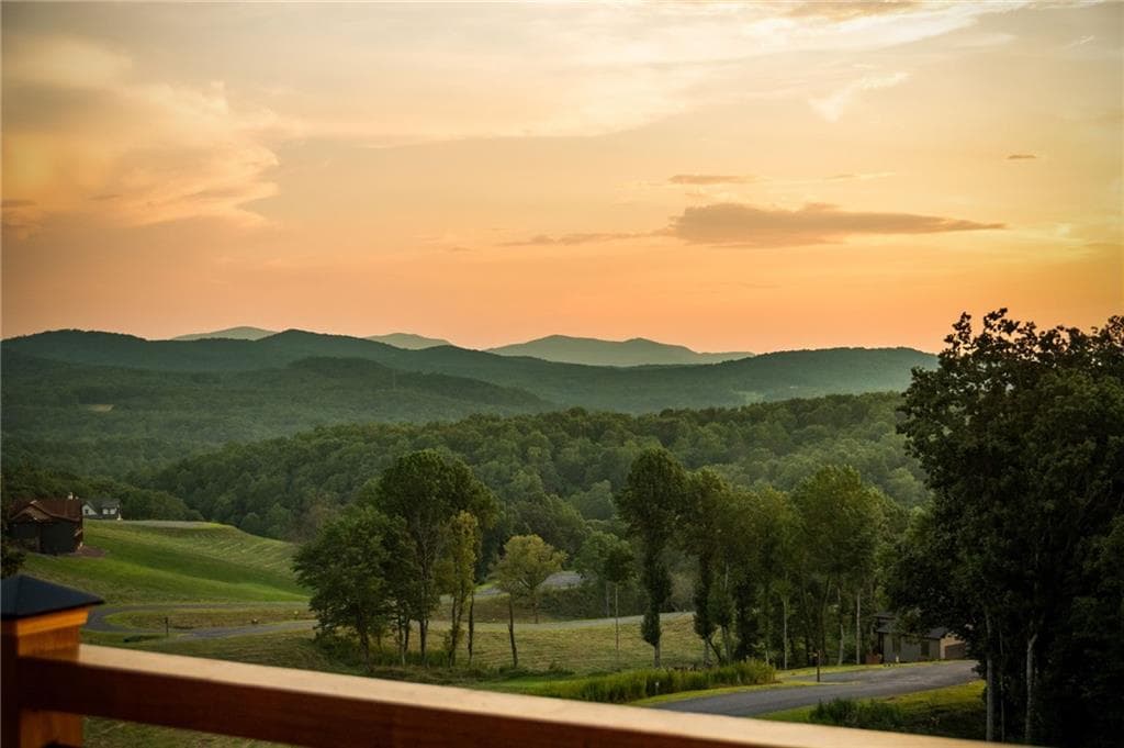 5 bedroom, 4 bathroom, 3,300 sq ft single family residence for sale at 261 Big Valley Drive, Morganton, GA 30513 — photo 4